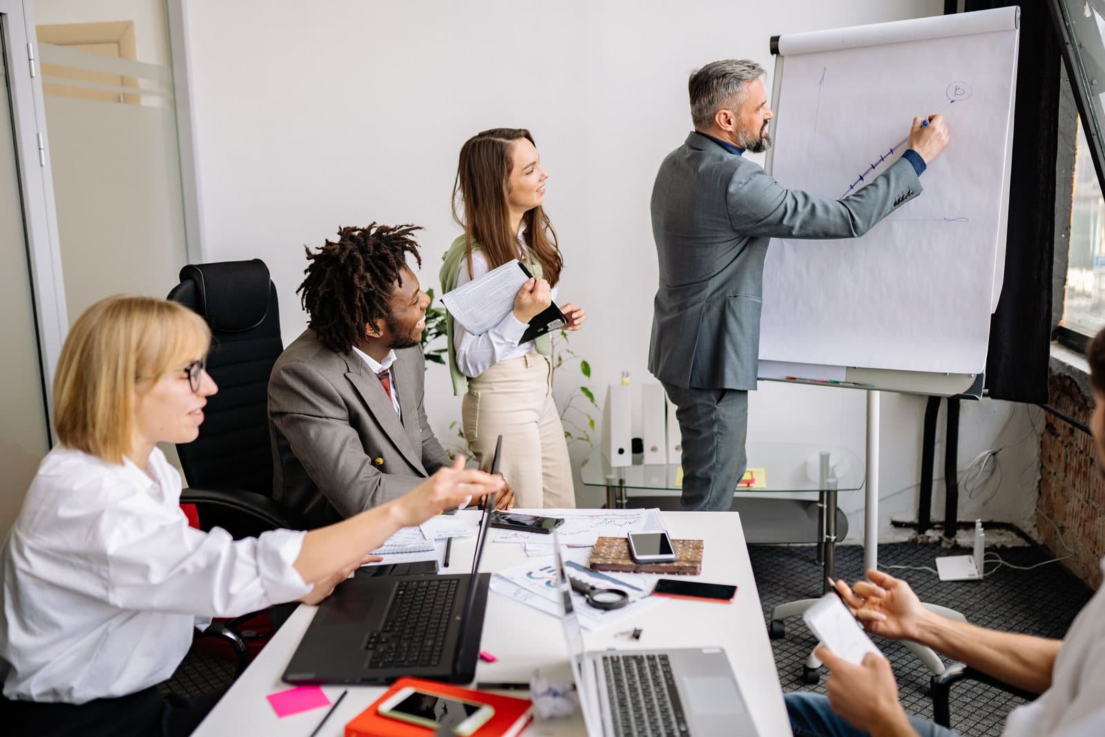 Consultants reviewing workforce data with a client team