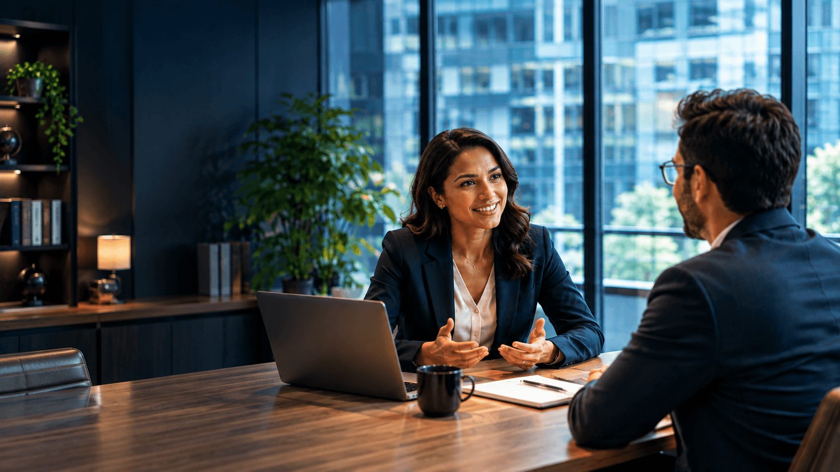 Business advisor speaking with a professional in a modern office